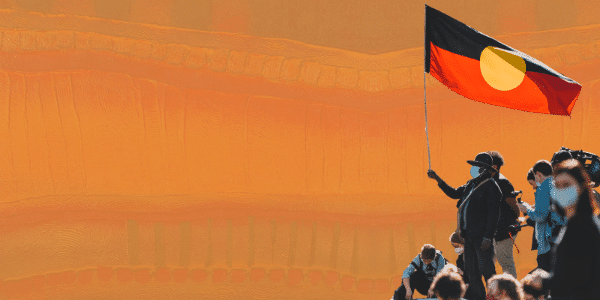 Allies waiving the Aboriginal Flag and standing up for First Nations people