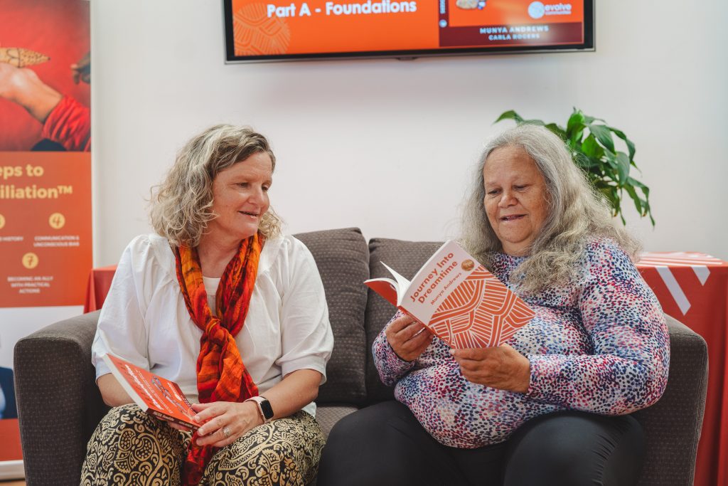 Carla and Aunty Munya with their books, Practical Reconciliation and Journey Into Dreamtime